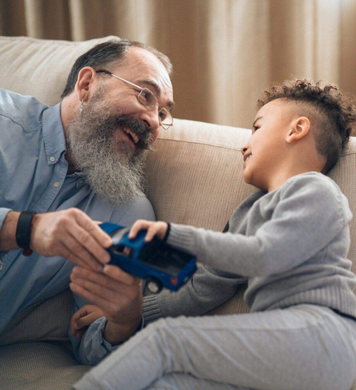 Business owner exited and happy with grandson.